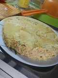 Tortilla de papa cocinada en caldo