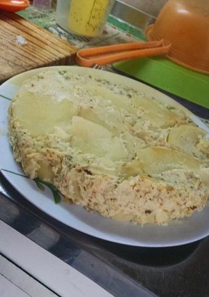 Una foto de Tortilla de papa cocinada en caldo