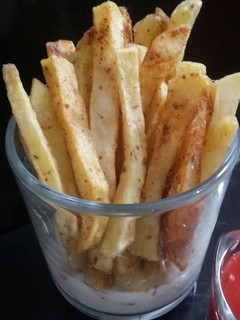 A picture of Hot and spicy french fries.