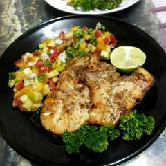 Grilled Chicken Steak with Black Pepper and Apple Mango Salsa A picture of Grilled Chicken Steak with Black Pepper and Apple Mango Salsa.