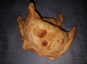 Una foto de Empanada pollo queso choclo