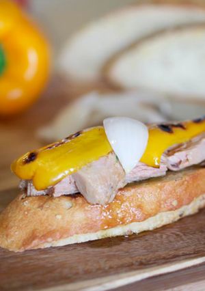 A picture of Tuna in olive oil, peppers and sweet onions on toast.