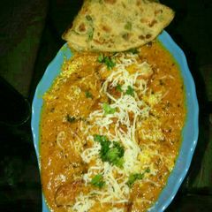 A picture of Paneer pasanda with coriander tepla.