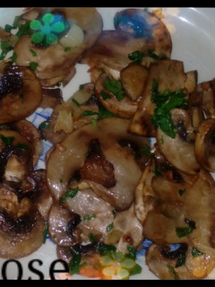 Una foto de Champiñones a la plancha