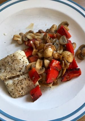 A picture of Cod with mushroom and red pepper.