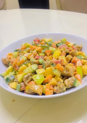 A picture of Chicken salad with thousand island dressing.