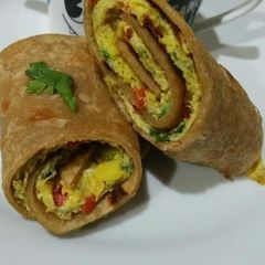 A picture of Omelette Paratha Roll😋💛.