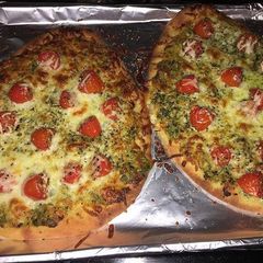 Naan Bread Pesto Pizza with Cherry tomatoes A picture of Naan Bread Pesto Pizza with Cherry tomatoes.