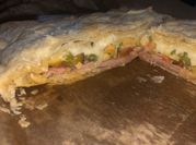 Una foto de empanadas capresse