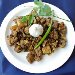 A picture of Pork Dry Masala (Kerala Style).