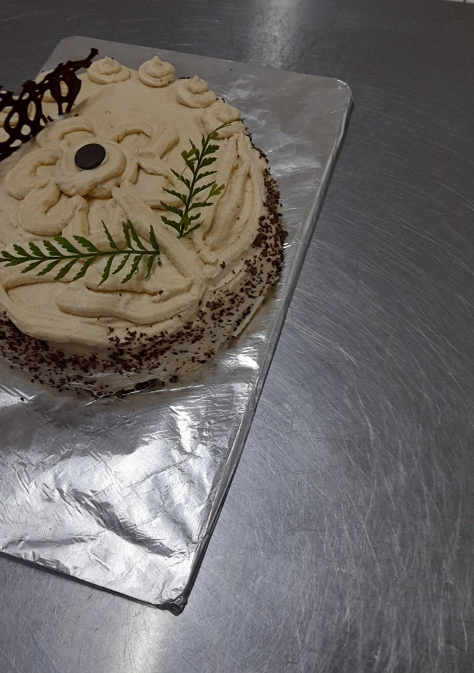 Una foto de Torta manjar moka