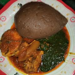 A picture of Ewedu soup and amala.