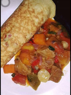 A picture of Egg with souce.