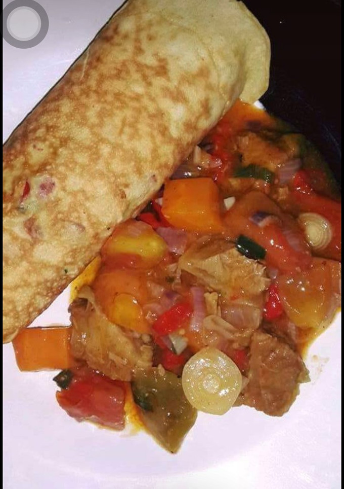 A picture of Egg with souce.