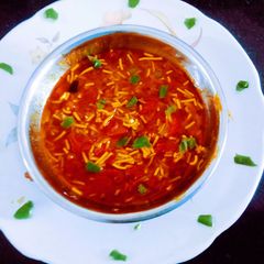 A picture of Tasty chatpattu Kathiyawadi sev tomato shaak(sabji).