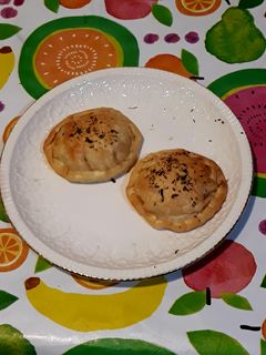 Una foto de Empanadillas redondas en dos rellenos