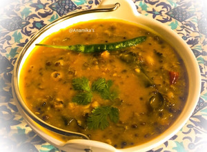 A picture of Kerala Style: Green Moong Dal Curry or Pachai Payaru Kuzhambu.