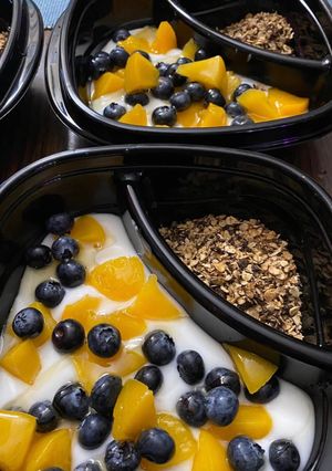 A picture of Easy blueberry and peach parfait.