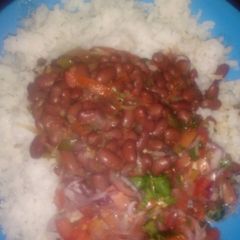 A picture of Beans rice with kachumbari.