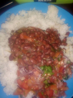 A picture of Beans rice with kachumbari.