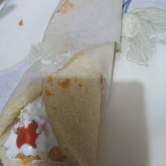 A picture of Tikka Shawarma and pitta bread homemade..