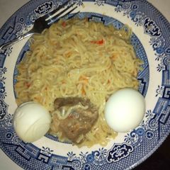 A picture of Indomie and boiled egg.