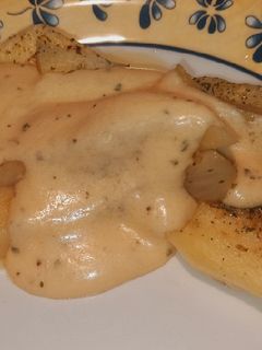 Una foto de Patatas microondas con salsa de queso