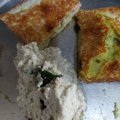 A picture of Schezwan masala dosa.