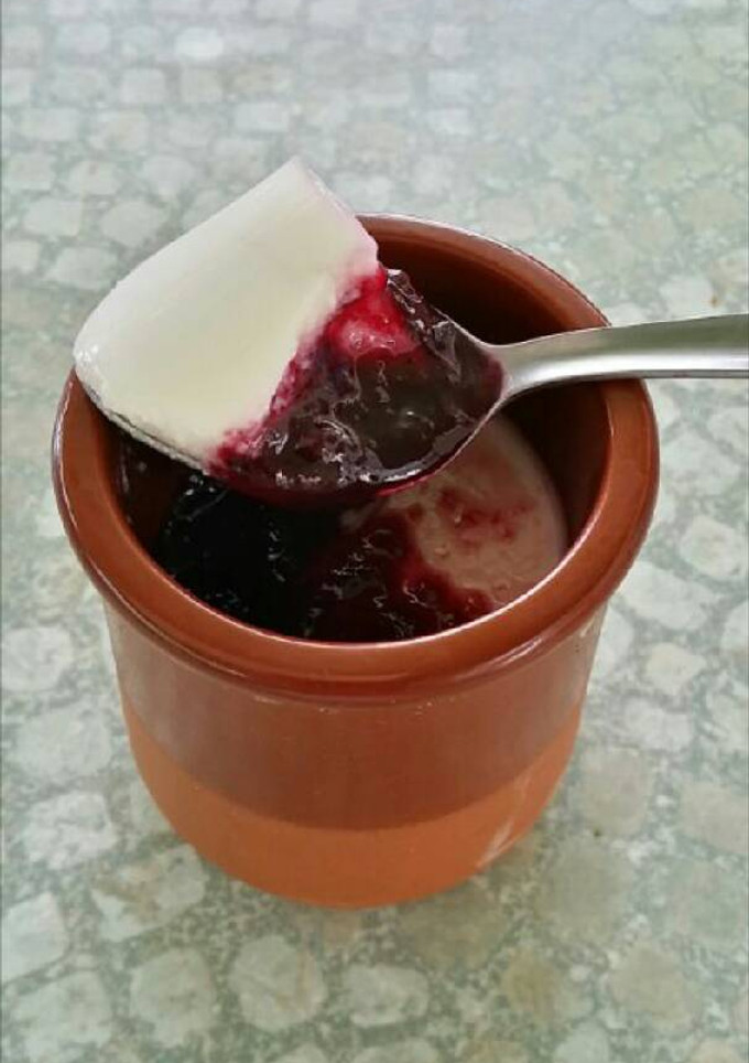 Una foto de Postre de queso philadelphia con arándanos