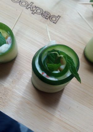 A picture of 1 bite cucumber 🥒 salad.