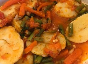 Una foto de Cacerola griega de ejotes con papas