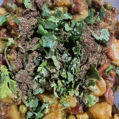 A picture of Mix Potato peas carrots curry.