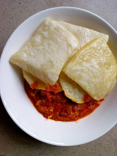 A picture of Fried yam and sauce.