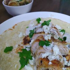 A picture of Sauteed Chicken & Feta Wrap.