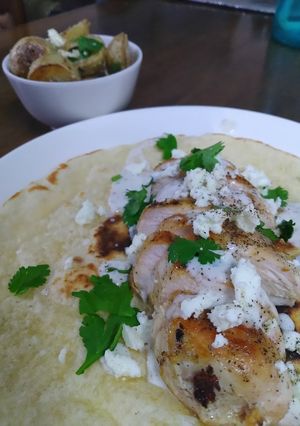 A picture of Sauteed Chicken & Feta Wrap.