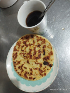 Una foto de Arepa con plátano maduro y queso