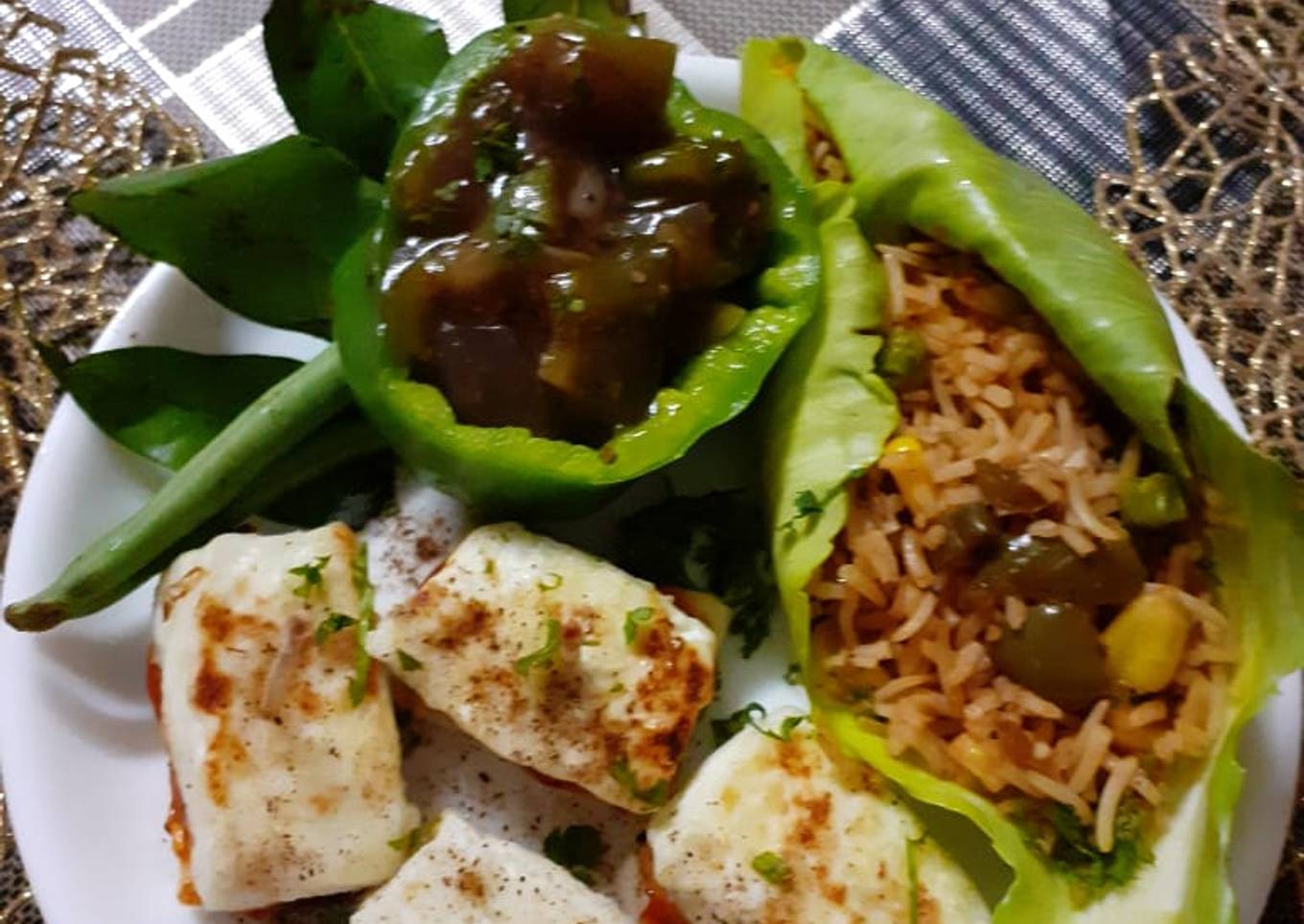 Fried rice with Manchurian gravy and paneer canapies