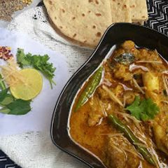 A picture of Ginger mutton (adraki gosht).