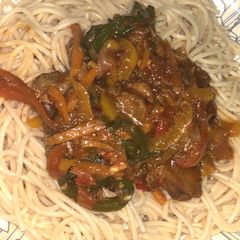 A picture of Pasta with chicken sauce.