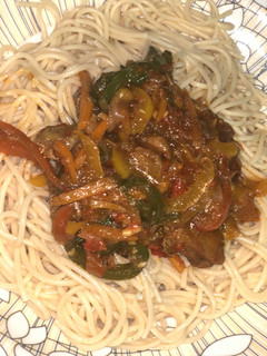 A picture of Pasta with chicken sauce.
