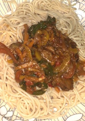A picture of Pasta with chicken sauce.