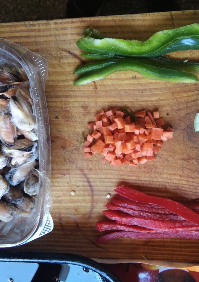 Una foto de Guiso de mejillones y camarones