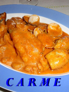 Una foto de Rape con almejas y salsa picante