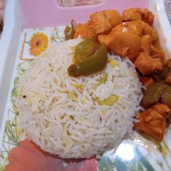 A picture of Chicken Manchurian with Egg Fried Rice.