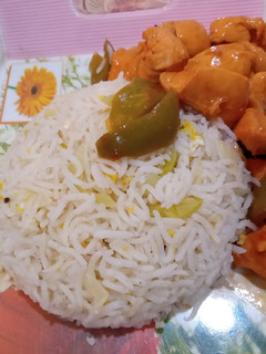 A picture of Chicken Manchurian with Egg Fried Rice.