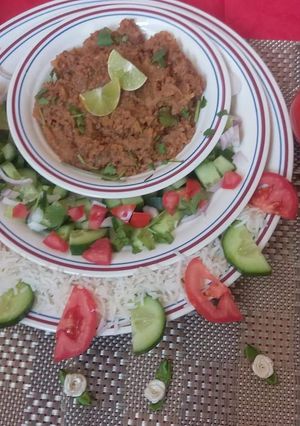 A picture of Seekh qeema in a pot.