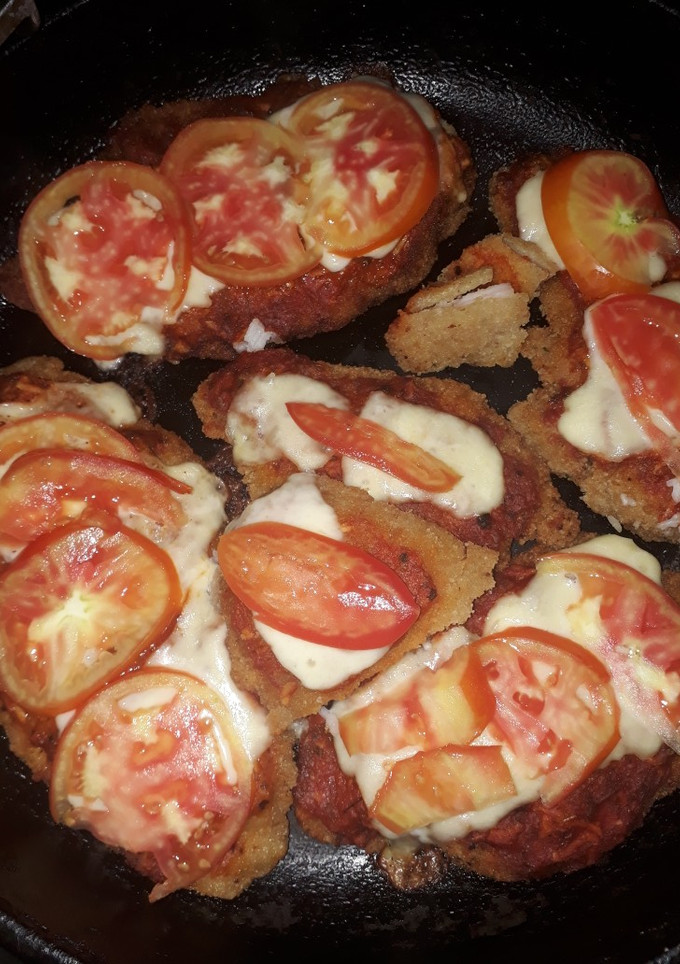Una foto de Milanesa napolitana