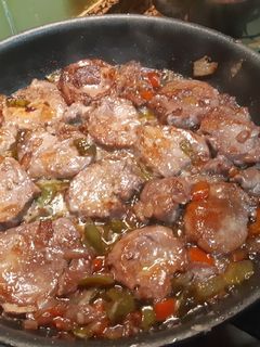 Una foto de Solomillo de cerdo con verduras y queso parmesano