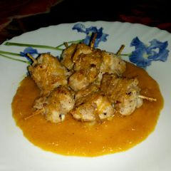 A picture of Chicken Tikka in Mango Sauce.