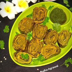 A picture of Authentic Rickwach with Urad Dal and Colocasia leaves.